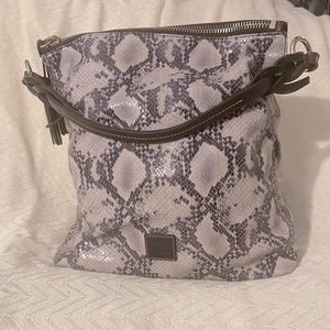 Dooney & Bourke large Python Sloan Slouchy Foldover tote bag.